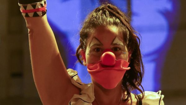 An Israeli protester gestures during a demonstration amid a second lockdown in front of Prime Minister Benjamin Netanyahu's residence in Jerusalem, on September 26, 2020, to protest the government's handling of the COVID-19 pandemic. Thousands of Israelis gathered in Jerusalem to demand the resignation of Prime Minister Benjamin Netanyahu, a day after the country tightened its lockdown aimed at slowing coronavirus spread. Emmanuel DUNAND / AFP