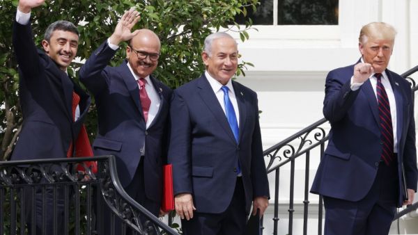 (L-R) Foreign Affairs Minister of the United Arab Emirates Abdullah bin Zayed bin Sultan Al Nahyan, Foreign Affairs Minister of Bahrain Abdullatif bin Rashid Al Zayani, Prime Minister of Israel Benjamin Netanyahu and U.S. President Donald Trump participate in the signing ceremony of the Abraham Accords on the South Lawn of the White House September 15, 2020 in Washington, DC. Witnessed by President Trump, Prime Minister Netanyahu signed a peace deal with the UAE and a declaration of intent to make peace wit