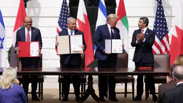 Witnessed by President Trump, Prime Minister Netanyahu signed a peace deal with the UAE and a declaration of intent to make peace with Bahrain. Alex Wong/Getty Images/AFP