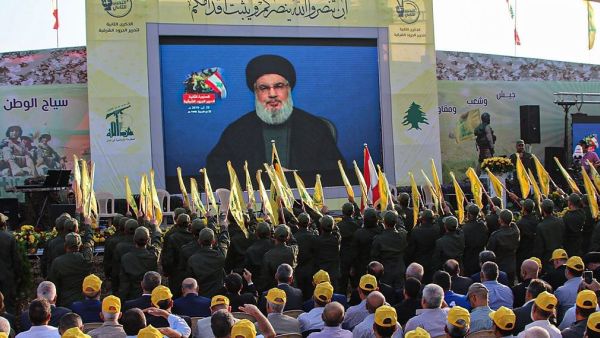 Hezbollah supporters watch a televised speech by Hezbollah leader Hassan Nasrallah (File photo/AFP) | File photo: AFP