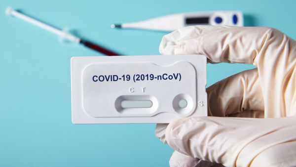 Doctor holding a test kit for viral disease COVID-19 2019-nCoV. (Shutterstock/ File Photo)