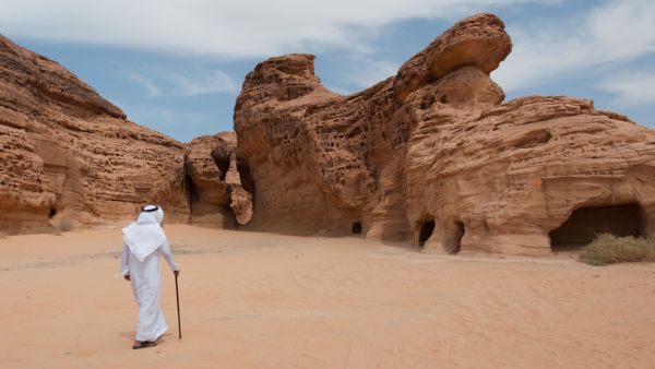 Saudian walking in Madain Saleh archeological site, Saudi Arabia. (Shutterstock/ File Photo)