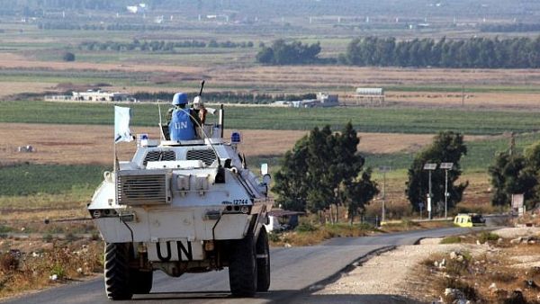Vehicles belonging to UN peacekeepers drive along a road along the Israel-Lebanon border near the southern Lebanese town of Kfar Kila on September 1, 2019. (Ali Dia/AFP)