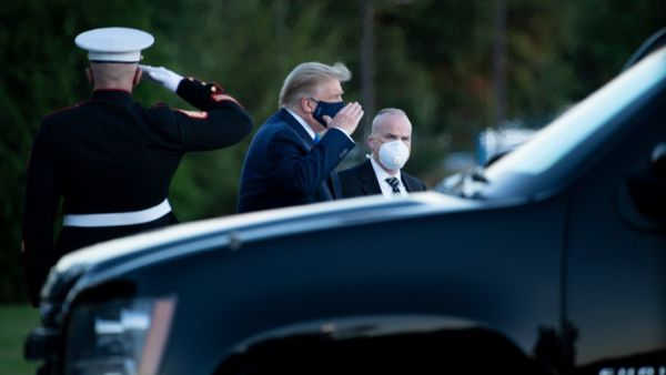 President Donald Trump will spend the coming days in a military hospital just outside Washington to undergo treatment for the coronavirus, but will continue to work, the White House said Friday Brendan Smialowski / AFP