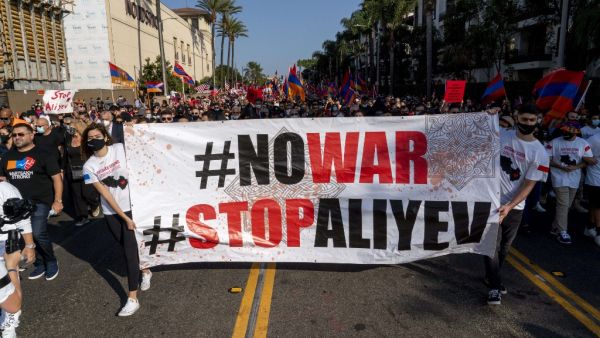People march from Pan Pacific Park to the Consulate General of Turkey, during a protest in support of Armenia and Karabakh amid the territorial dispute with Azerbaijan over Nagorno-Karabakh, in Los Angeles, California, October 11, 2020. Kyle Grillot / AFP