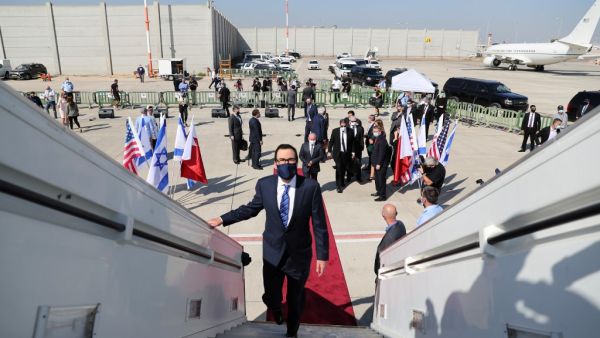 US Treasury Secretary Steve Mnuchin boards the El Al flight to Bahrain's capital Manama at Israel's Ben Gurion Airport near Tel Aviv on October 18, 2020, after the two states reached a US-brokered normalisation deal last month. RONEN ZVULUN / POOL / AFP US Treasury Secretary Steve Mnuchin boards the El Al flight to Bahrain's capital Manama at Israel's Ben Gurion Airport near Tel Aviv on October 18, 2020, after the two states reached a US-brokered normalisation deal last month. RONEN ZVULUN / POOL / AFP