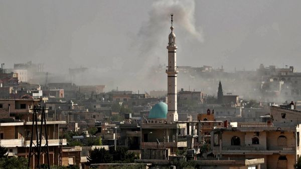 This picture taken on October 27, 2020 shows smoke rising from Syrian government forces' bombardment on the village of al-Bara, in the southern part of the rebel-held northwestern province of Idlib. OMAR HAJ KADOUR / AFP