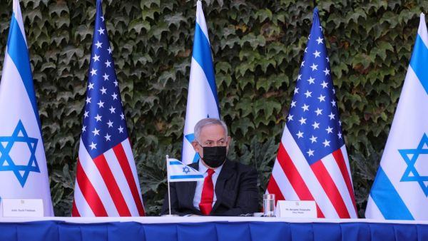 Israeli Prime Minister Benjamin Netanyahu attends a ceremony for the signing of an extension of the Israeli-US scientific cooperation agreement at the Ariel University, in the occupied West Bank on October 29, 2020. Emil SALMAN / POOL / AFP