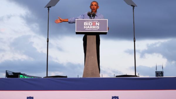 Former U.S. President Barack Obama speaks at a drive-in rally for Democratic presidential nominee Joe Biden on October 21, 2020 in Philadelphia, Pennsylvania. The campaign stop is the first in-person event for the former president on behalf of his former vice president. Biden is polling ahead of President Donald Trump in this battleground state that Trump narrowly won in 2016. Michael M. Santiago/Getty Images/AFP Michael M. Santiago / GETTY IMAGES NORTH AMERICA / Getty Images via AFP