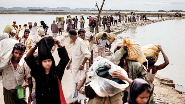 130,000 Rohingya Muslims who remain in refugee camps in Rakhine state live under “squalid and abusive” conditions (AFP)