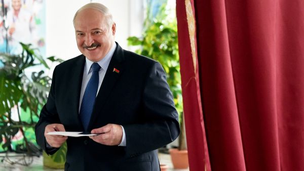 Belarus' President Alexander Lukashenko votes at a polling station during the presidential election in Minsk on Sunday. Photo: AFP