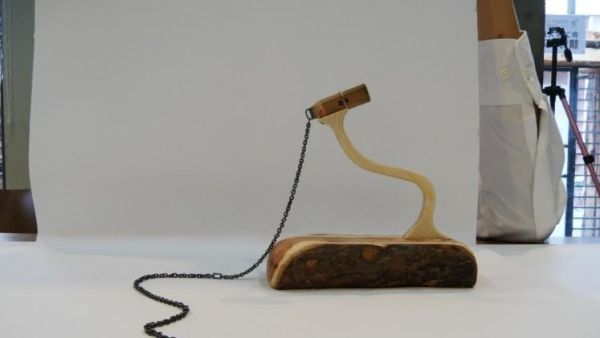 Lee Chien-chu broke a Guinness World Record by carving a chain of 168 links from the graphite inside a single pencil. (Photo courtesy of Guinness World Records)