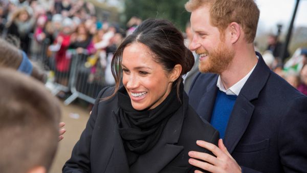 Prince Harry and his fiance Meghan Markle greet schoolchildren on their arrival at Cardiff Castle. (Shutterstock/ File Photo)