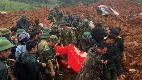 Rocks rained down on the barracks of a military station in Quang Tri province, with 22 soldiers believed to have been buried underneath thick mud. (AFP)