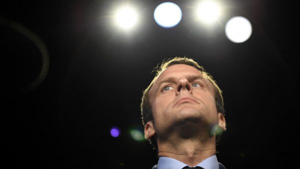 In this file photograph taken on April 4, 2017, then French presidential election candidate for the En Marche ! movement Emmanuel Macron looks on prior to a debate organised by the French private TV channels BFM TV and CNews, between the eleven candidates for the French presidential election, on April 4, 2017 in La Plaine-Saint-Denis near Paris. Lionel BONAVENTURE / POOL / AFP