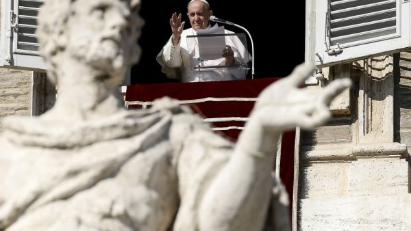 Pope Francis blesses worshippers as he delivers the Sunday Angelus prayer from the window of his study overlooking St.Peter's Square, at the Vatican on November 1, 2020 during the Covid-19 pandemic, caused by the novel coronavirus. Filippo MONTEFORTE / AFP