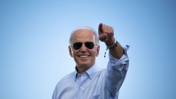 In this file photo taken on October 29, 2020 Democratic Presidential candidate and former US Vice President Joe Biden gestures prior to delivering remarks at a Drive-in event in Coconut Creek, Florida. Joe Biden has won the US presidency over Donald Trump, TV networks projected on November 7, 2020, a victory sealed after the Democrat claimed several key battleground states won by the Republican incumbent in 2016. CNN, NBC News and CBS News called the race in his favor, after projecting he had won the decisi