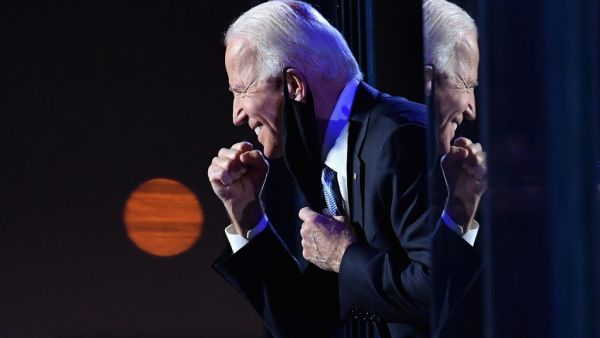 US President-elect Joe Biden gestures to the crowd after he delivered remarks in Wilmington, Delaware, on November 7, 2020. (AFP)