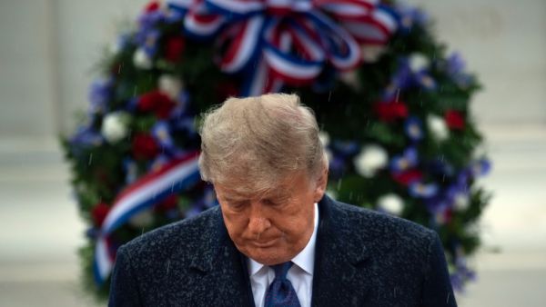 US President Donald Trump leaves after placing a wreath at the Tomb of the Unknown Soldier on Veterans Day at Arlington National Cemetery in Arlington, Virginia, on November 11, 2020. Brendan Smialowski / AFP