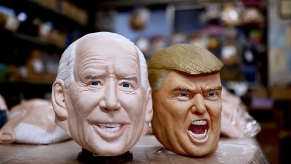 Rubber masks of US President-elect Joe Biden (L) and US President Donald Trump are seen at the Ogawa Studios mask factory in Saitama, north of Tokyo on November 12, 2020. Behrouz MEHRI / AFP