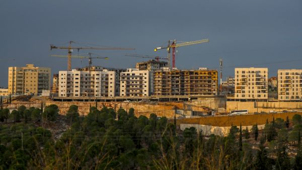 A picture taken on November 12, 2020 shows a view of ongoing construction work at Ramat Shlomo, a Jewish settlement in the Israeli-annexed eastern sector of Jerusalem. Israel has approved building of about 100 settlement homes at the same site where settlement expansion plans unveiled during a 2010 visit by then-US vice president Joe Biden angered Washington, an NGO said on November 12. AHMAD GHARABLI / AFP
