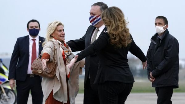 US Secretary of State Mike Pompeo walks to a motorcade vehicle after stepping off a plane at Paris Le Bourget Airport on November 14, 2020, in Le Bourget, at the start of a 10-day trip to Europe and the Middle East. Patrick Semansky / POOL / AFP