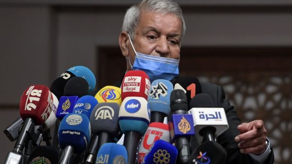 The chairman of the Libyan political accord committee, member of the High Council of State Bachir El Haouch speaks to journalists during a press conference on the UN-led Libyan talks, in the tunisian capital Tunis, on November 14, 2020. FETHI BELAID / AFP