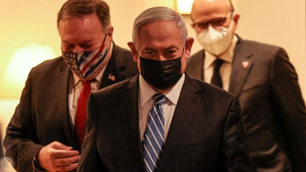 (L to R) US Secretary of State Mike Pompeo, Israeli Prime Minister Benjamin Netanyahu, and Bahrain's Foreign Minister Abdullatif bin Rashid Al Zayani, all mask-clad due to the COVID-19 coronavirus pandemic, arrive for a press conference after their trilateral meeting in Jerusalem on November 18, 2020. Menahem KAHANA / POOL / AFP