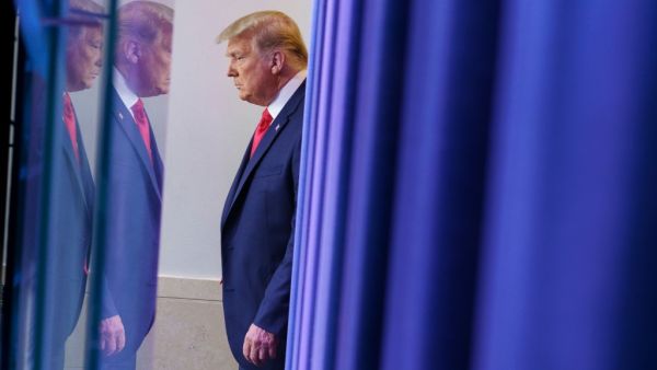 US President Donald Trump arrives to deliver remarks on the stock market during an unscheduled appearance in the Brady Briefing Room of the White House in Washington, DC on November 24, 2020. MANDEL NGAN / AFP