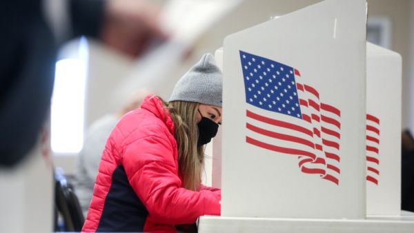 A voter marks her ballot at Bloomfield United Methodist Church on November 3, 2020 in Des Moines, Iowa. After a record-breaking early voting turnout, Americans head to the polls on Election Day to cast their vote for incumbent U.S. President Donald Trump or Democratic nominee Joe Biden in the 2020 presidential election. Mario Tama/Getty Images/AFP MARIO TAMA / GETTY IMAGES NORTH AMERICA / Getty Images via AFP