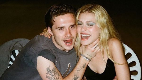 The smitten couple shared a snap of their matching costumes on Sunday night