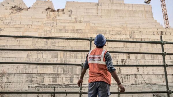 Construction worker eyes progress on the Grand Ethiopian Renaissance Dam in Ethiopia last December (AFP) Construction worker eyes progress on the Grand Ethiopian Renaissance Dam in Ethiopia last December (AFP)