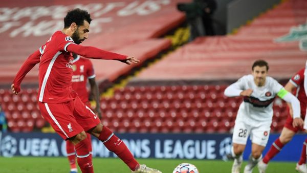 The former Reds striker believes the Egyptian is merely doing what is expected of him when going to ground under contact inside the box (Photo: AFP)