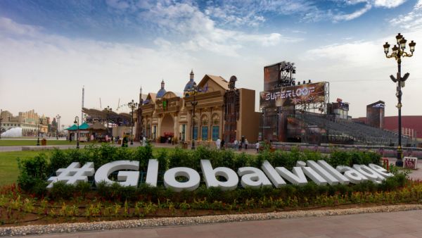 hashtag global village sign in the center of the village. (Shutterstock/ File Photo)