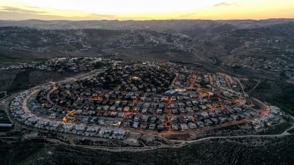 This picture taken on November 17, 2020 shows an aerial view of the Israeli settlement of Tekoa in the occupied West Bank, south of Bethlehem. MENAHEM KAHANA / AFP
