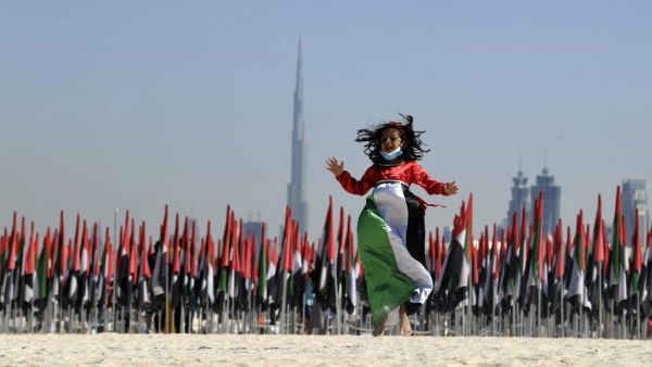 Emiratis attend celebrations of UAE's national day on December 2, 2020. Karim SAHIB / AFP