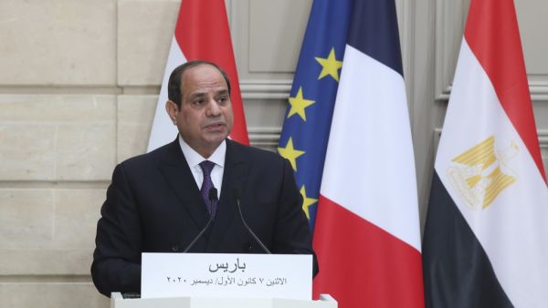 Egyptian President Abdel Fattah al-Sisi speaks during a press conference with French President following their meeting at the Elysee presidential Palace on December 7, 2020 in Paris, as part of al-Sisi's three-day controversial state visit to France, with activists warning Paris not to turn a blind eye to Cairo's rights record with a red carpet welcome. Michel Euler / POOL / AFP