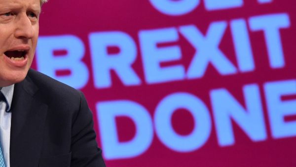 In this file photo taken on October 02, 2019 Britain's Prime Minister Boris Johnson delivers his keynote speech to delegates on the final day of the annual Conservative Party conference at the Manchester Central convention complex, in Manchester, north-west England. Ben STANSALL / AFP