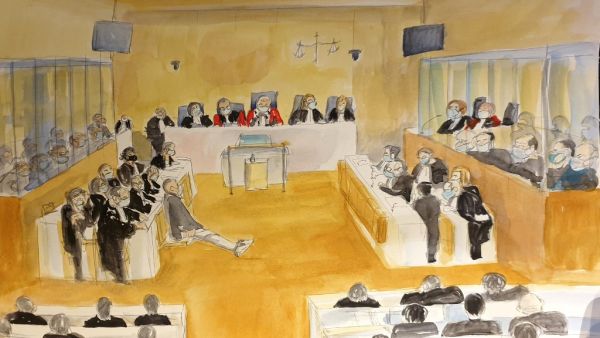 This court sketch made on December 16, 2020 shows a general view at the Paris courthouse during the sentencing hearing in the trial of 14 suspected accomplices of the Islamist gunmen who murdered seventeen people over three days of attacks in January 2015, beginning with the massacre of 12 people at the satirical weekly Charlie Hebdo. Marie WILLIAMS / AFP
