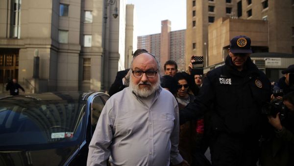 A file photo taken on November 20, 2015 shows Jonathan Pollard, the American convicted of spying for Israel, leaving a New York court house following his release from prison on November 20, 2015 in New York. Pollard, an American jailed in the US in 1985 for spying for Israel, landed in the Jewish state on December 30, 2020, where he was received by Prime Minister Benjamin Netanyahu. SPENCER PLATT / GETTY IMAGES NORTH AMERICA / AFP