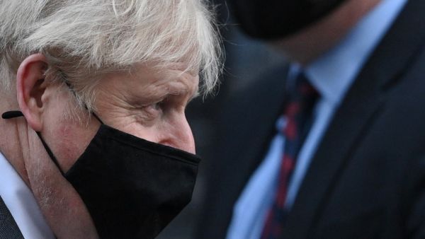 Britain's Prime Minister Boris Johnson leaves 10 Downing Street in London on December 30, 2020 ahead of opening the debate on the second reading of the EU (Future Relationship) Bill in the House of Commons. Members of the British parliament were set to debate and vote on legislation on the UK's future relationship with the EU as EU leaders signed their post-Brexit trade deal with Britain and dispatched it to London on an RAF jet, setting their seal on a drawn-out divorce. JUSTIN TALLIS / AFP