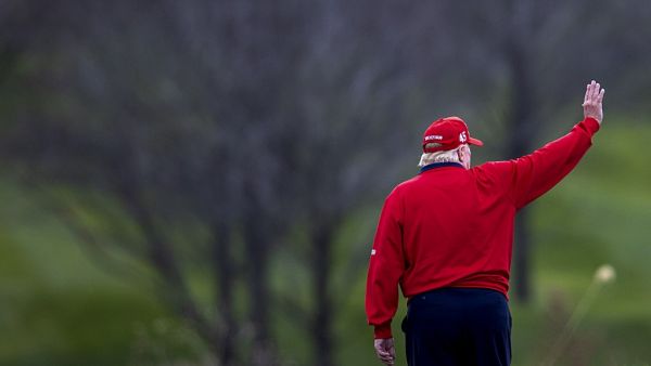 US President Donald Trump walks to Marine One after golfing at Trump National Golf Club on November 27, 2020 in Sterling, Virginia. President Trump heads to Camp David for the weekend after playing golf. Tasos Katopodis/Getty Images/AFP