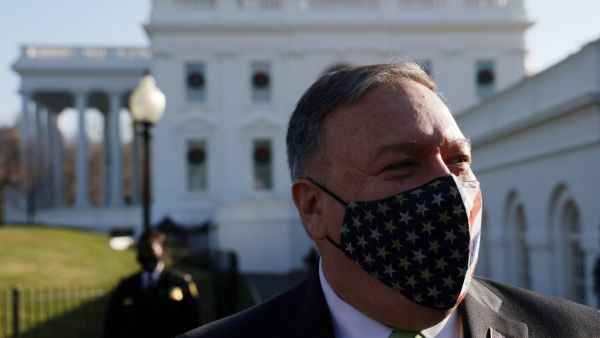 U.S. Secretary of State Mike Pompeo walks on the ground of the White House December 11, 2020 in Washington, DC. Secretary Pompeo gave a tour of the White House to his family and announced to the press that his son just got engaged. Alex Wong/Getty Images/AFP ALEX WONG / GETTY IMAGES NORTH AMERICA / Getty Images via AFP