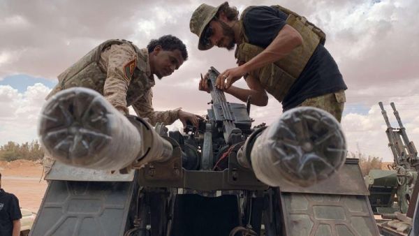 Troops loyal to Libya’s GNA prepare their weapons as they carry out patrols near Abu Qareen, Libya September 15. (AFP)