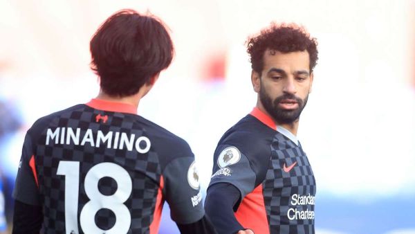 صلاح ومينامينو خلال لقاء ليفربول وكريستال بالاس