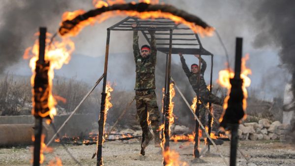 Turkey-backed Syrian fighters take part in military training at a base near the village of Al-Maabatli in the Afrin region in the northwestern Aleppo province countryside, on January 2, 2021. Bakr ALKASEM / AFP