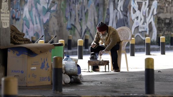 Under the new measures, non-essential workers are barred from leaving their homes, and supermarkets are supposed to operate delivery services only.  JOSEPH EID / AFP