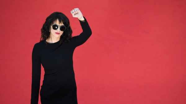 In this file photo taken on May 19, 2018 Italian actress Asia Argento gestures as she arrives on the red carpet for the closing ceremony of the 71st edition of the Cannes Film Festival in southern France. In an interview published on January 22, 2021 with Italian daily Corriere della Sera, leading #MeToo figure Asia Argento made fresh accusations of sexual abuse, directed at "The Fast and the Furious" US director Rob Cohen, saying the assault happened while she was filming Cohen's action movie "xXx" in 2002