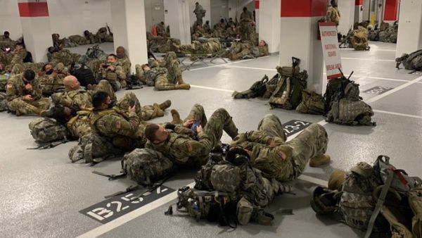 US National Guard who were forced to rest in a garage (Twitter)