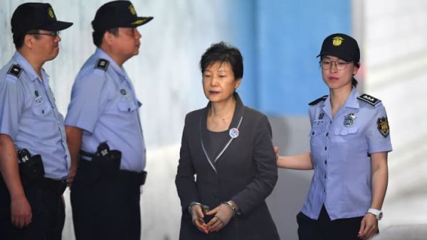 South Korea’s ousted president Park Geun-Hye arrives at the Seoul Central District Court in Seoul on Aug. 7, 2017 for her trial over the massive corruption scandal that led to her downfall. Jung Yeon-Je | AFP | Getty Images